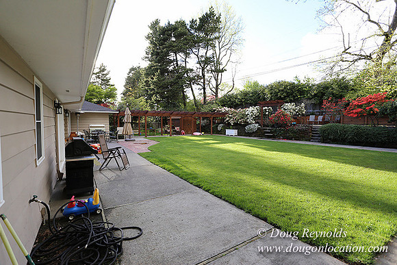 Mid Century Traditional Style Home, With a Basement, 2 car garage average sized Back Yard with Patio and Fire Pit.