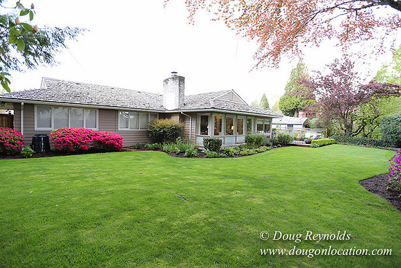 Mid Century Traditional Style Home, With a Basement, 2 car garage average sized Back Yard with Patio.