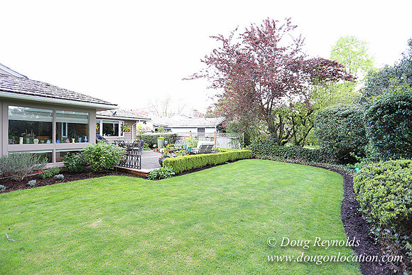 Mid Century Traditional Style Home, With a Basement, 2 car garage average sized Back Yard with Patio.