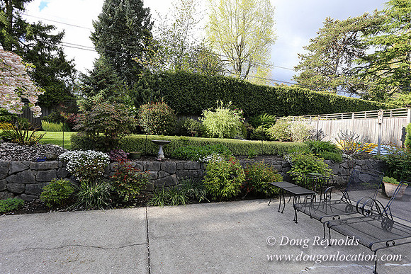 Mid Century Traditional Style Home, With a Basement, 2 car garage average sized 2 leval Back Yard with Patio and Fire Pit.
