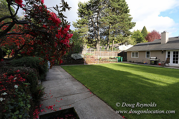 Mid Century Traditional Style Home, With a Basement, 2 car garage average sized Back Yard with Patio and Fire Pit.