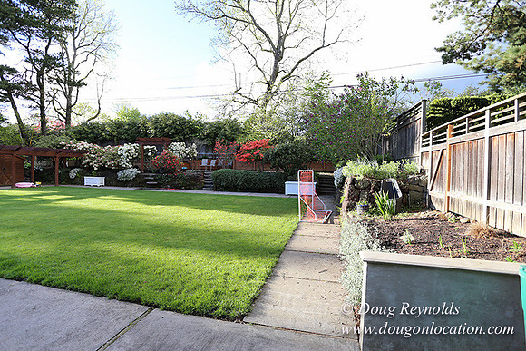Mid Century Traditional Style Home, With a Basement, 2 car garage average sized Back Yard with Patio and Fire Pit.