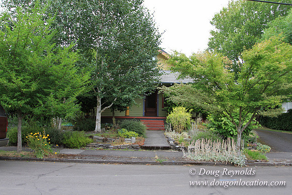 Laura’s Home This is a Portland Bungalow Style small home with a average sized and interesting back yard, nice garden with bee hive’s