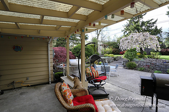 Mid Century Traditional Style Home, With a Basement, 2 car garage average sized 2 leval Back Yard with Patio and Fire Pit.