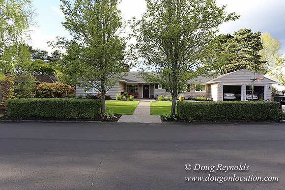 Mid Century Traditional Style Home, With a Basement, 2 car garage average sized Back Yard with Patio and Fire Pit.