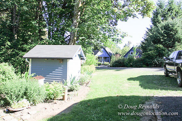 Traditional Style Home small farm with large kitchen great room, 2 story, 2 car garage on Acreage with large back yard, large front yard, garden, pond, deck, goats, bees, shop, PDX Zone