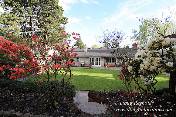Mid Century Traditional Style Home, With a Basement, 2 car garage average sized Back Yard with Patio and Fire Pit.