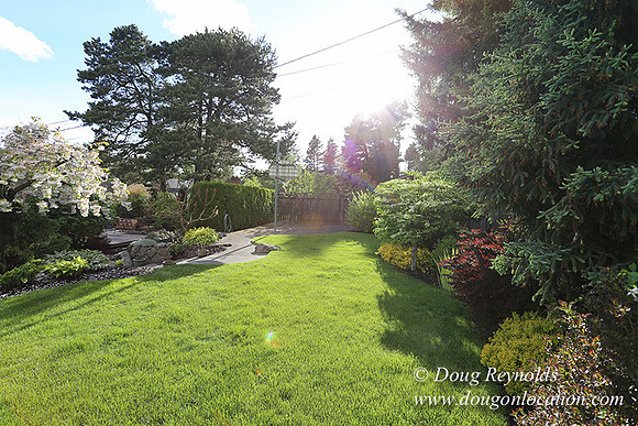 Mid Century Traditional Style Home, With a Basement, 2 car garage average sized 2 leval Back Yard with Patio and Fire Pit.