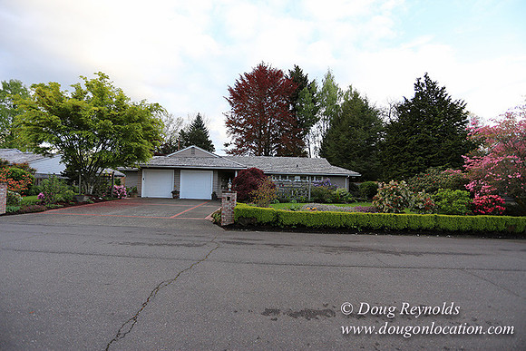 Mid Century Traditional Style Home, With a Basement, 2 car garage average sized Back Yard with Patio.