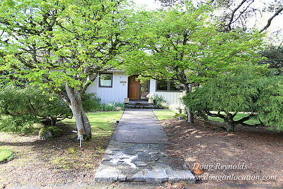 Mid Century Traditional Style Home, With a Basement, 2 car garage average sized Back Yard with Patio