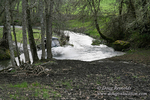 Ranch 14 has 7500 Acres of rolling green hills barns Creeks water crossing Bridges and miles of Dirt roads Oak trees Cabins Forest land