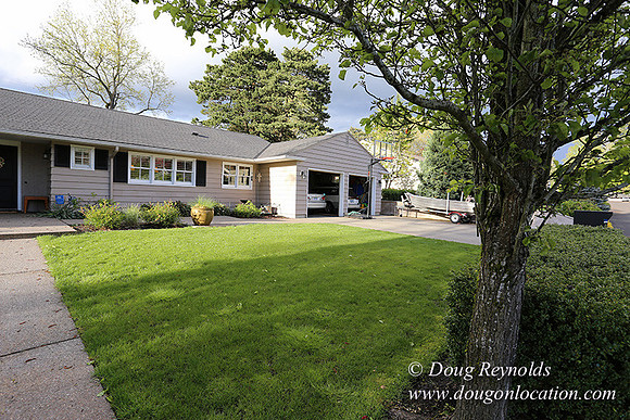 Mid Century Traditional Style Home, With a Basement, 2 car garage average sized Back Yard with Patio and Fire Pit.