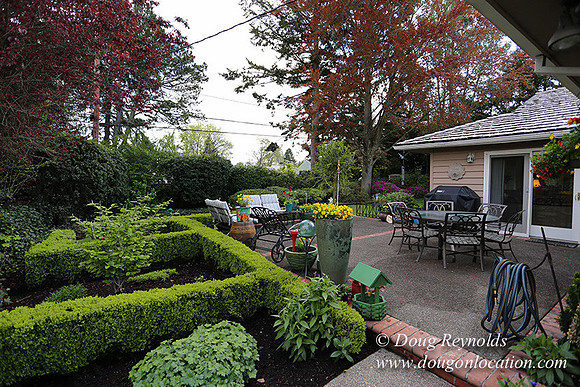 Mid Century Traditional Style Home, With a Basement, 2 car garage average sized Back Yard with Patio.