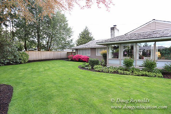 Mid Century Traditional Style Home, With a Basement, 2 car garage average sized Back Yard with Patio.