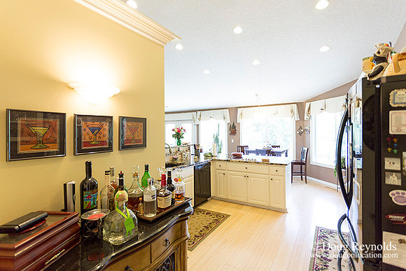 The house is a beautiful newer traditional with large rooms and lots of windows. Modern kitchen and great room, large master suite, large entry with French doors.