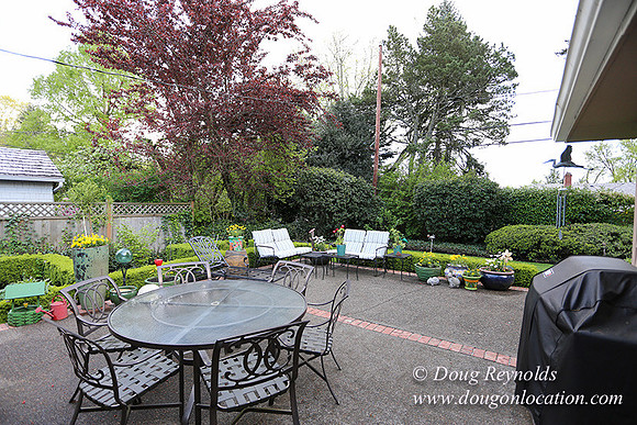 Mid Century Traditional Style Home, With a Basement, 2 car garage average sized Back Yard with Patio.