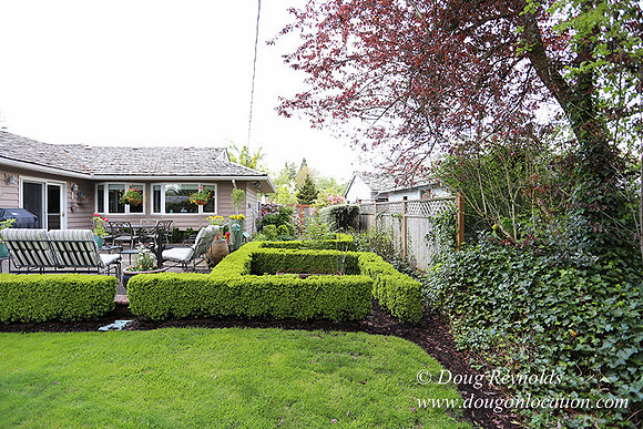 Mid Century Traditional Style Home, With a Basement, 2 car garage average sized Back Yard with Patio.