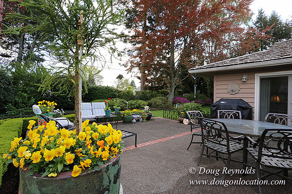 Mid Century Traditional Style Home, With a Basement, 2 car garage average sized Back Yard with Patio.