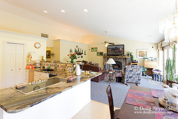 The house is a beautiful newer traditional with large rooms and lots of windows. Modern kitchen and great room, large master suite, large entry with French doors.