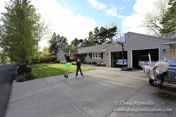Mid Century Traditional Style Home, With a Basement, 2 car garage average sized Back Yard with Patio and Fire Pit.