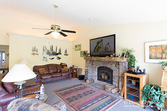 The house is a beautiful newer traditional with large rooms and lots of windows. Modern kitchen and great room, large master suite, large entry with French doors.