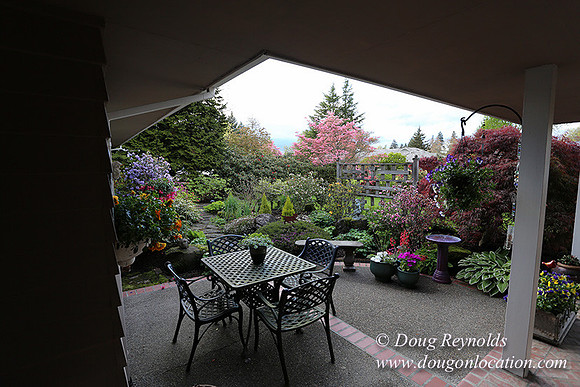 Mid Century Traditional Style Home, With a Basement, 2 car garage average sized Back Yard with Patio.