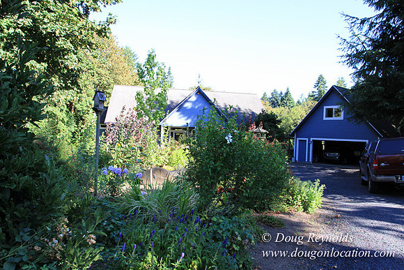 Traditional Style Home small farm with large kitchen great room, 2 story, 2 car garage on Acreage with large back yard, large front yard, garden, pond, deck, goats, bees, shop, PDX Zone