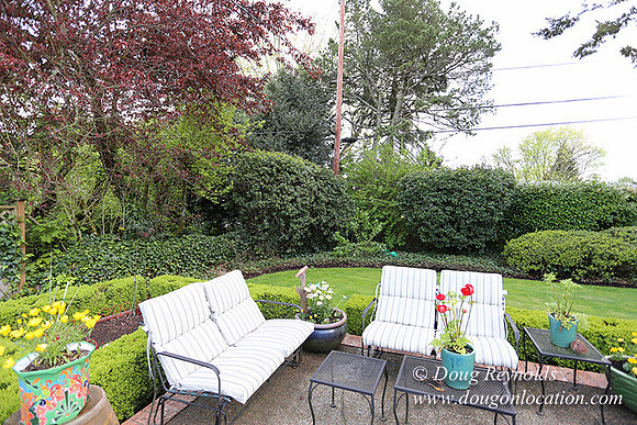 Mid Century Traditional Style Home, With a Basement, 2 car garage average sized Back Yard with Patio.