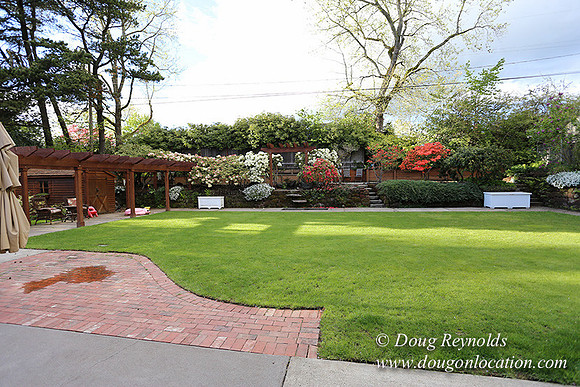 Mid Century Traditional Style Home, With a Basement, 2 car garage average sized Back Yard with Patio and Fire Pit.