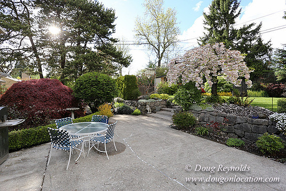 Mid Century Traditional Style Home, With a Basement, 2 car garage average sized 2 leval Back Yard with Patio and Fire Pit.