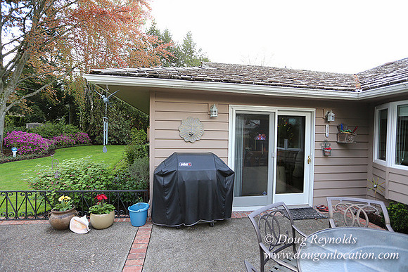 Mid Century Traditional Style Home, With a Basement, 2 car garage average sized Back Yard with Patio.
