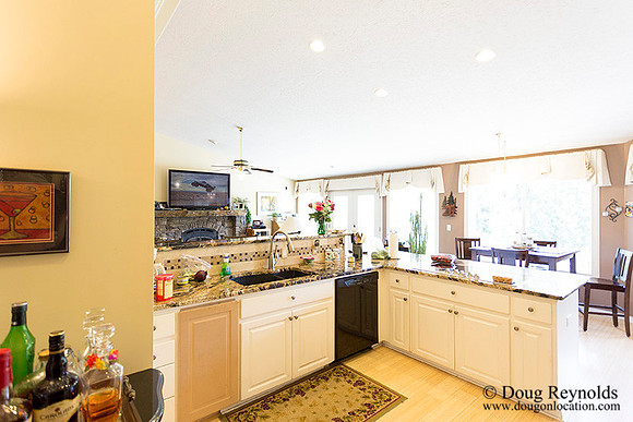 The house is a beautiful newer traditional with large rooms and lots of windows. Modern kitchen and great room, large master suite, large entry with French doors.