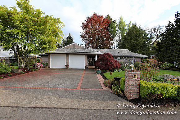 Mid Century Traditional Style Home, With a Basement, 2 car garage average sized Back Yard with Patio.