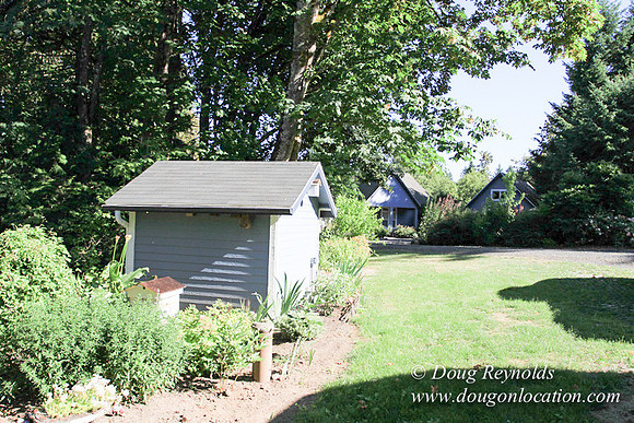 Traditional Style Home small farm with large kitchen great room, 2 story, 2 car garage on Acreage with large back yard, large front yard, garden, pond, deck, goats, bees, shop, PDX Zone