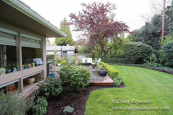Mid Century Traditional Style Home, With a Basement, 2 car garage average sized Back Yard with Patio.