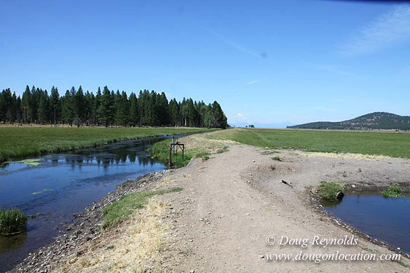 Ranch 18 South side of Hwy  has 2500 Acres of green fields Creeks water crossing Bridges on a Large Lake and miles of Dirt roads Oak trees  Forest land ATV Trails cows