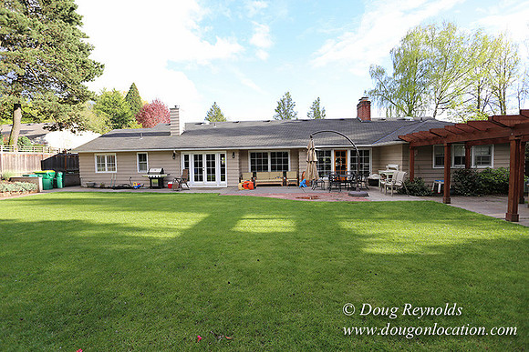 Mid Century Traditional Style Home, With a Basement, 2 car garage average sized Back Yard with Patio and Fire Pit.