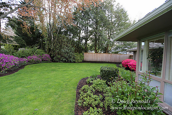 Mid Century Traditional Style Home, With a Basement, 2 car garage average sized Back Yard with Patio.