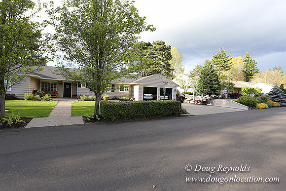 Mid Century Traditional Style Home, With a Basement, 2 car garage average sized Back Yard with Patio and Fire Pit.