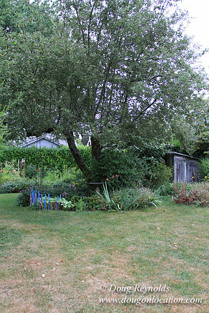 Laura’s Home This is a Portland Bungalow Style small home with a average sized and interesting back yard, nice garden with bee hive’s