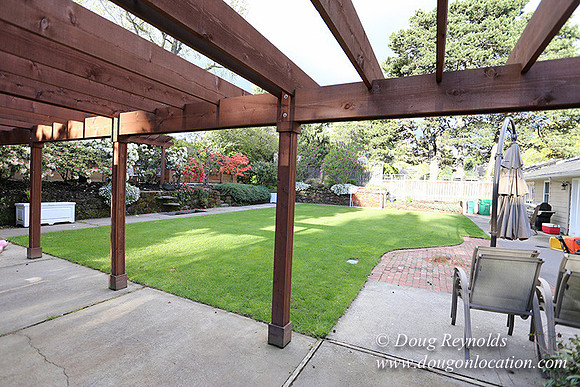 Mid Century Traditional Style Home, With a Basement, 2 car garage average sized Back Yard with Patio and Fire Pit.