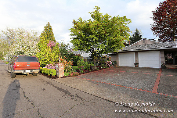 Mid Century Traditional Style Home, With a Basement, 2 car garage average sized Back Yard with Patio.
