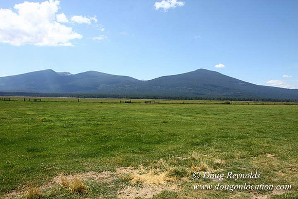 2500 Acres of green fields Creeks water crossing Bridges on a Large Lake and miles of Dirt roads Oak trees Forest land ATV Trails cows